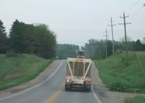 Gravel trucks on the hills of Airport Road